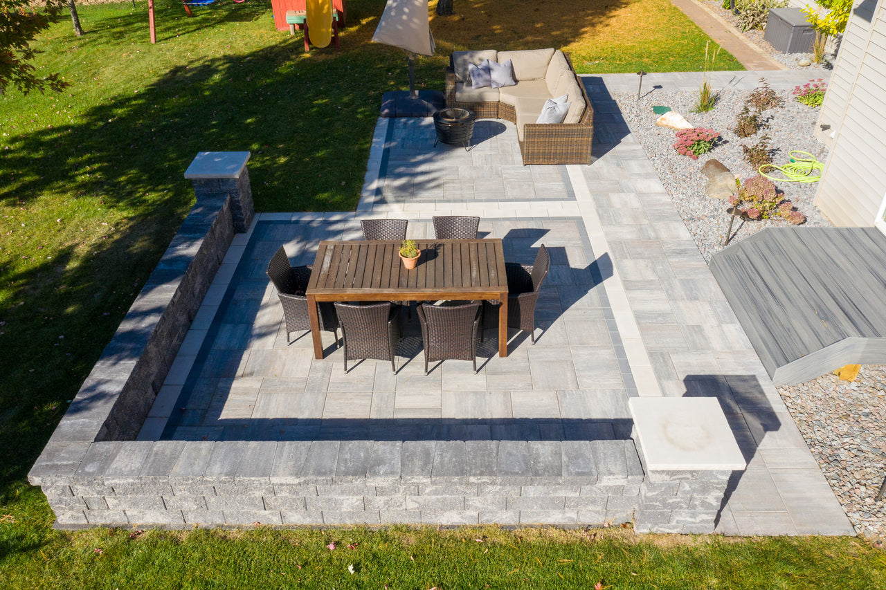 Grand Discover Pavers Product Photo 5 Discover Paver Set patio with double border with dining and lounging area.