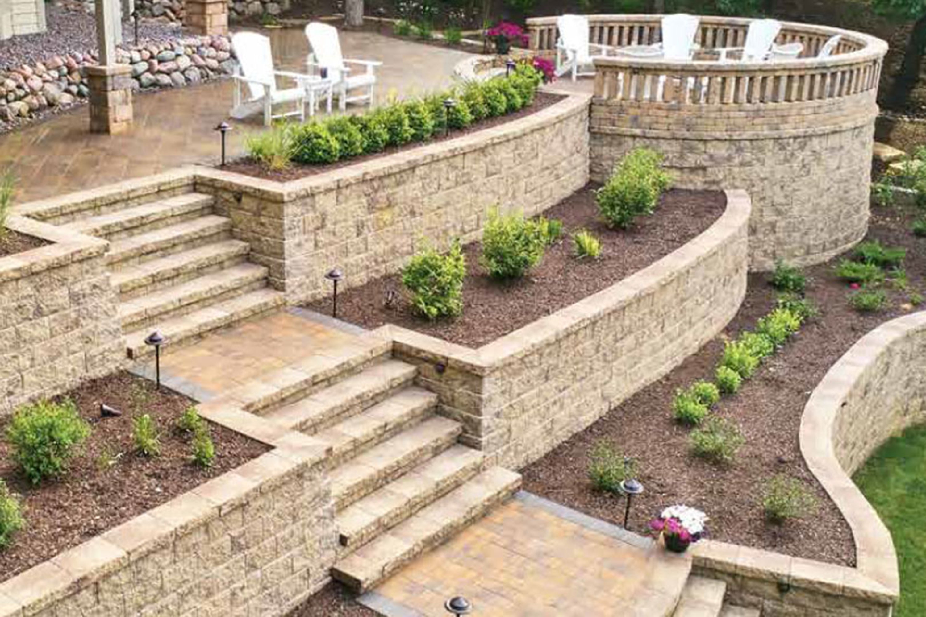 Passageways Stepping Units Product Photo 1 Stairway built with Passageways Stepping Units with rock bed and garden on either side