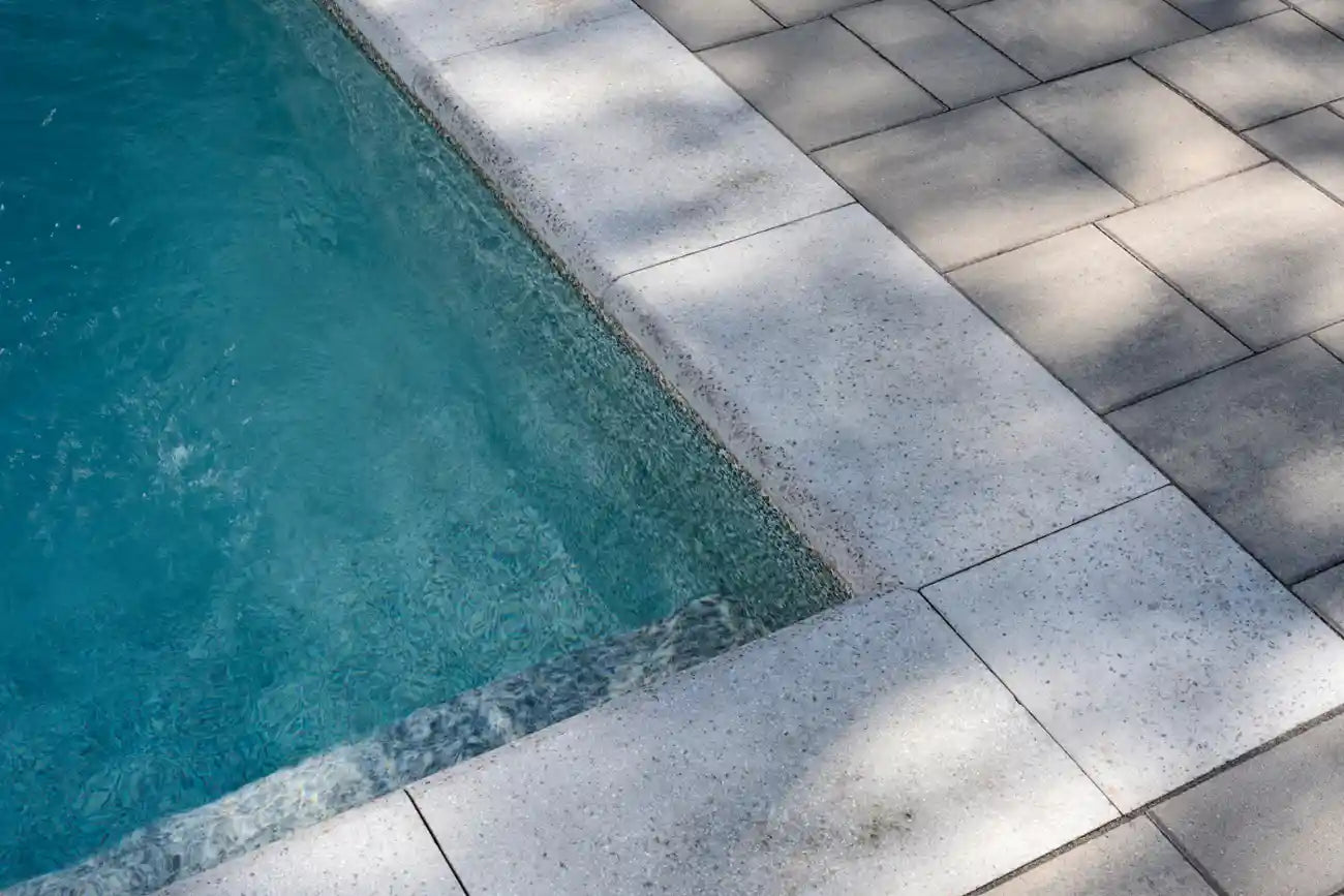 Laguna Coping Product Photo Laguna Coping installed on the edge of a pool