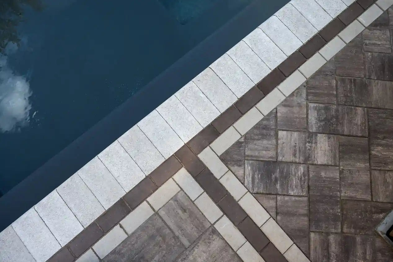 Demi Prestige Pool Coping installed on the edge of a pool.