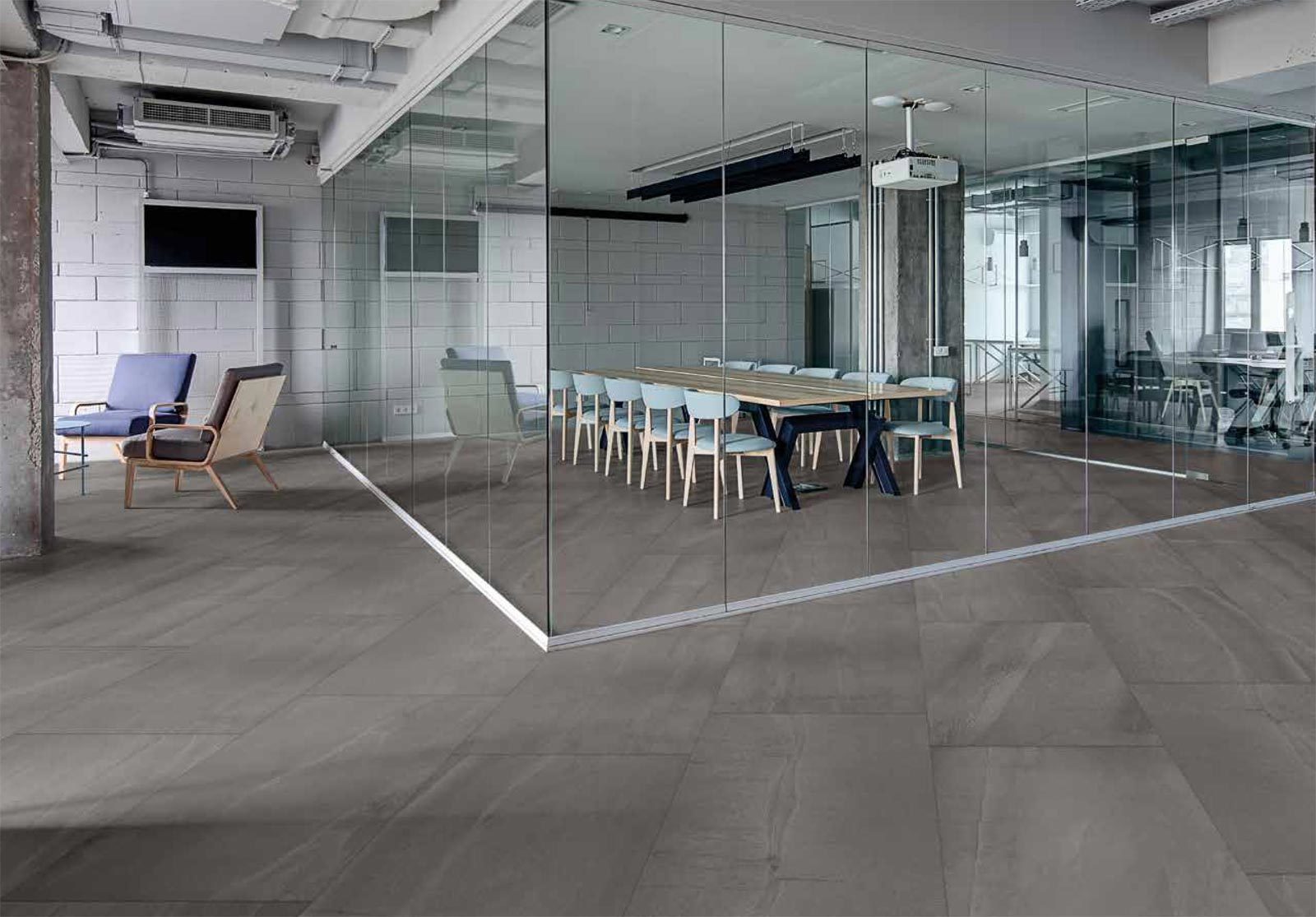 Office area and conference room install with dark tiles on the floor