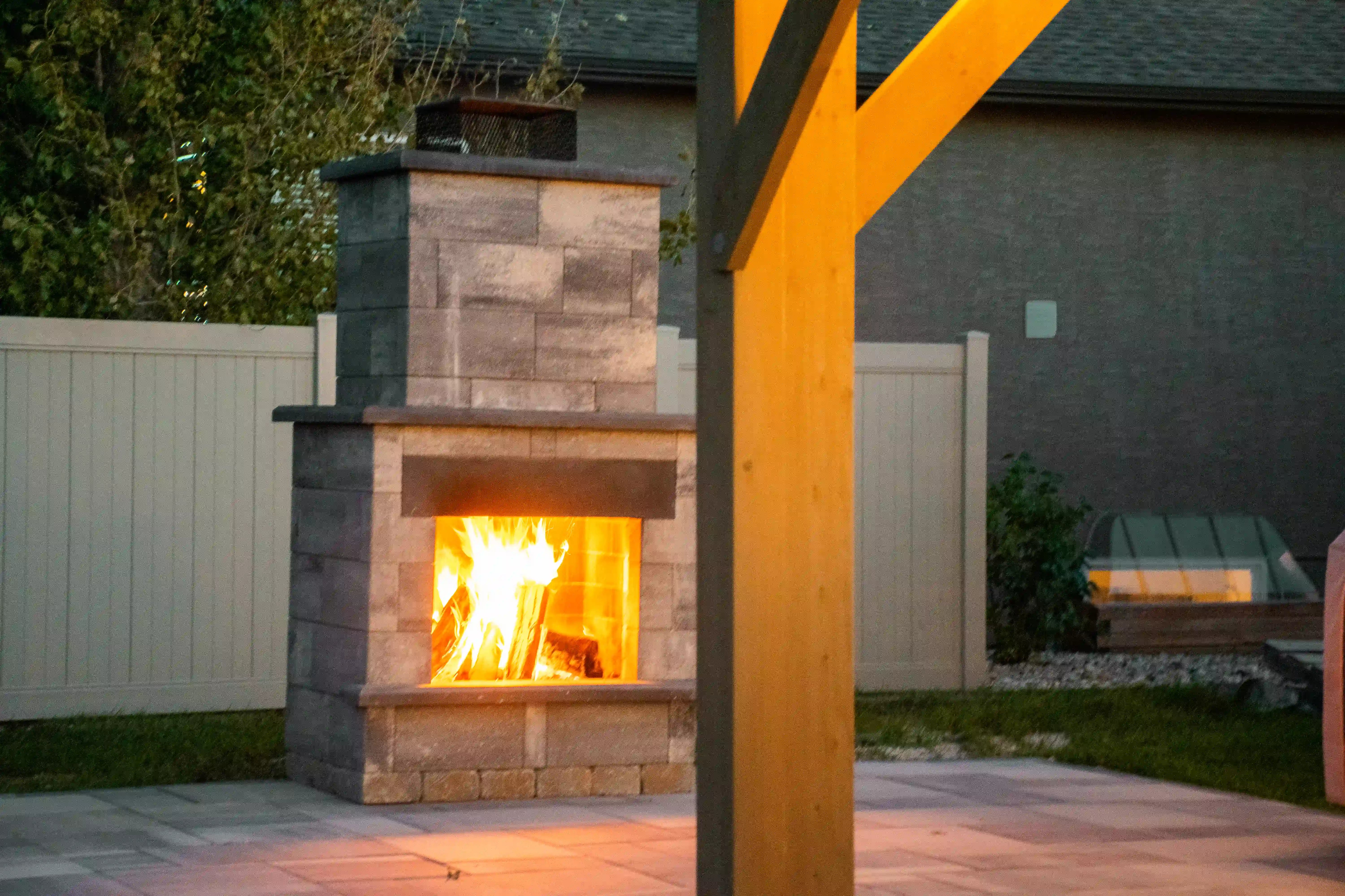 Smooth Metropolitan Fire Place in Majestic Grey and Obsidian accents in the snow.
