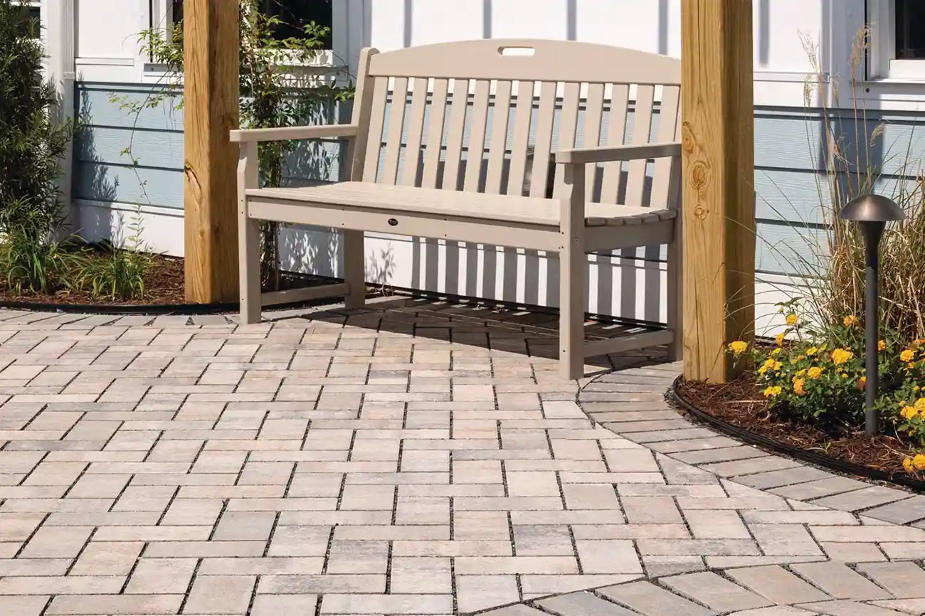 Walkway and a staircase made with Passageway Stepping Units surrounded by a rock bed and boulders
