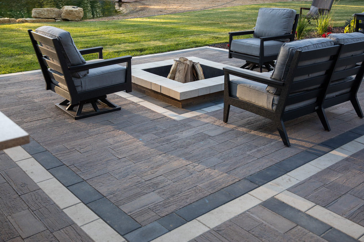 Modern fire pit. Customizable square fire pit made with summit pavers. Patio made with Hardwood plank pavers.