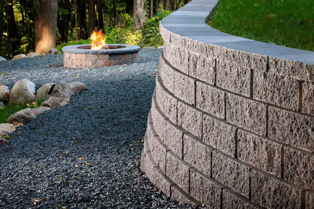 Summit Round Fire Pit on top of a patio made with Papyrus Pavers