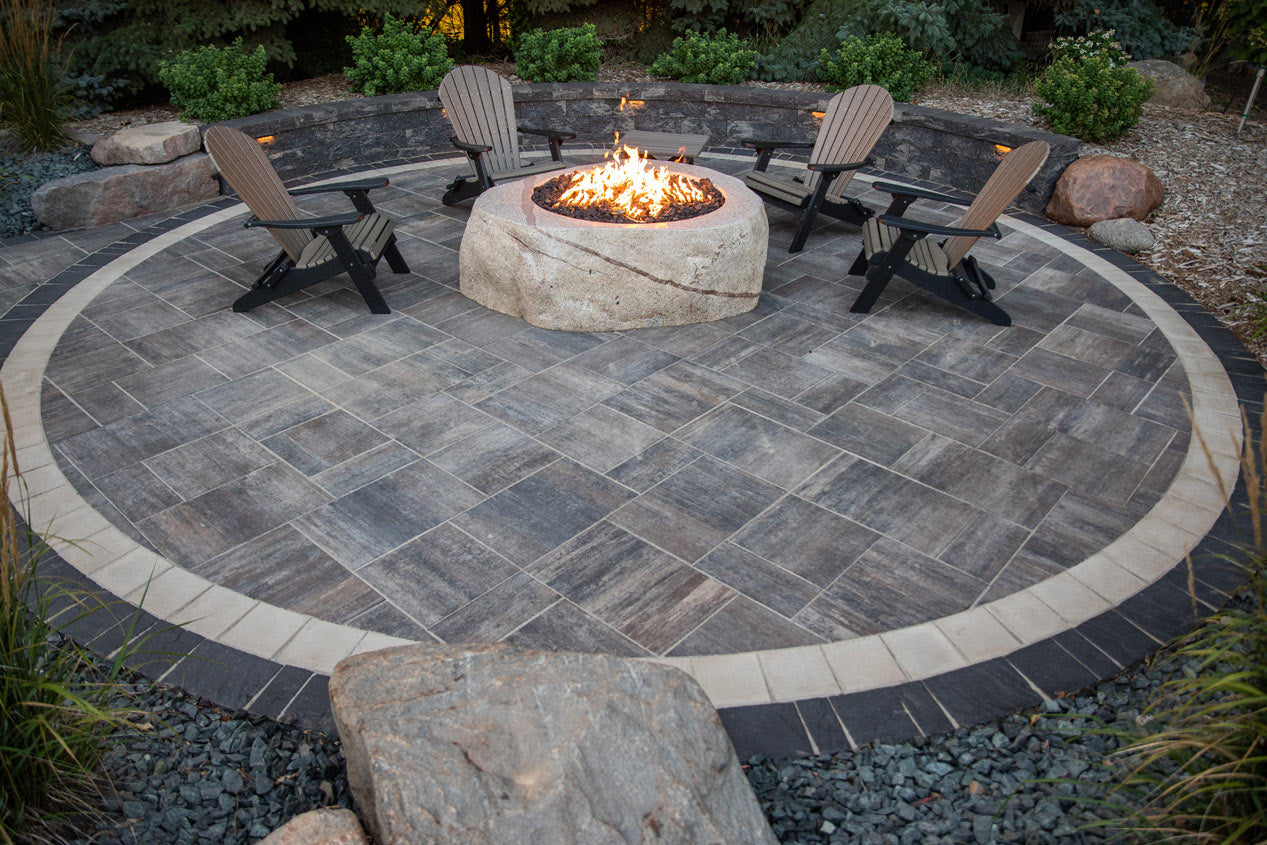 Grand Discover pavers used in a circle patio. Brown and grey mix colour Timeless.