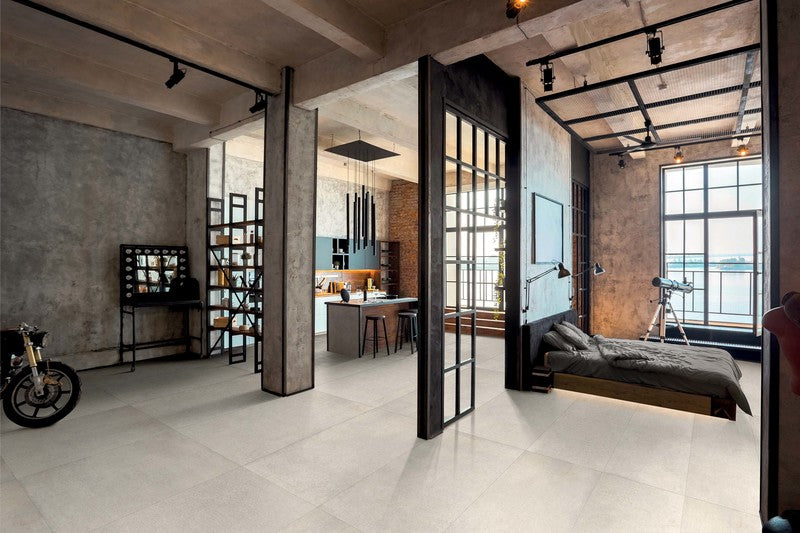 Modern Industrial style living area and bathroom with Concrete like porcelain tiles used as flooring.