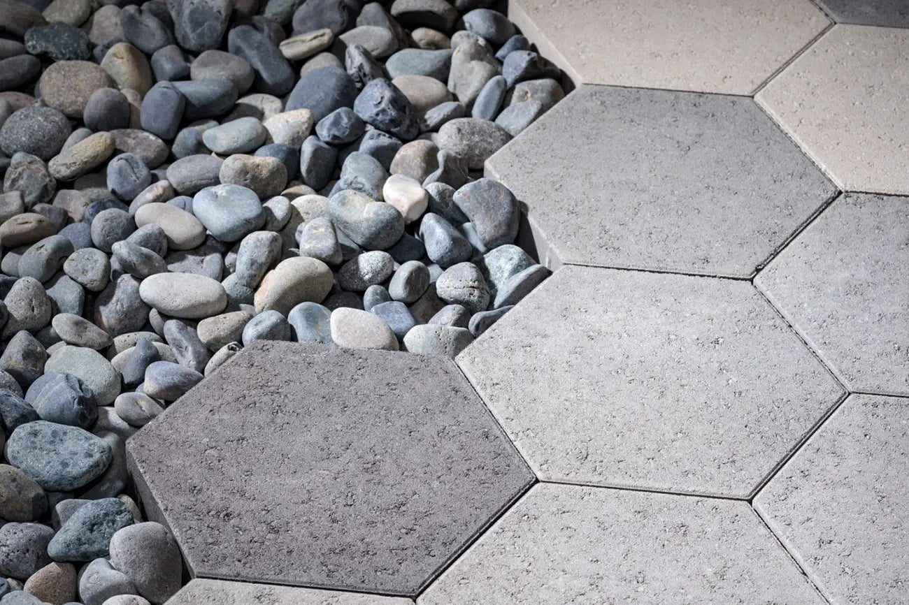 Hexagon paver in Scandina Grey with a rock bag