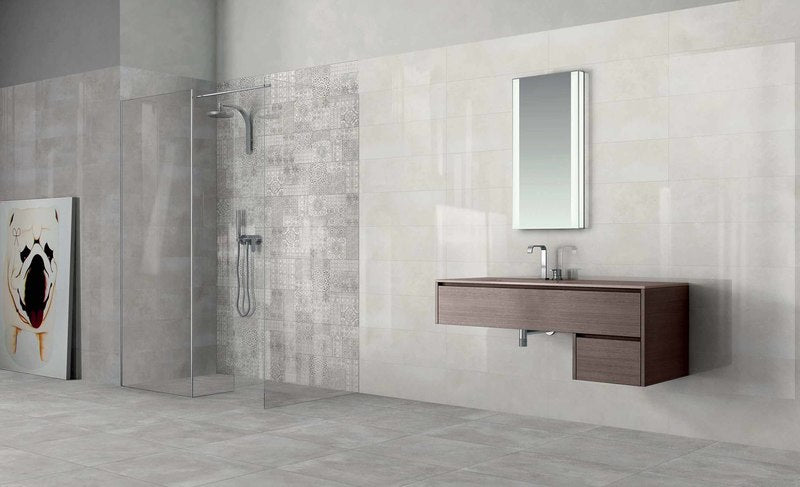 Bathroom and shower installed with Harmony Tiles in the colour Pearl and Decor Lucido.
