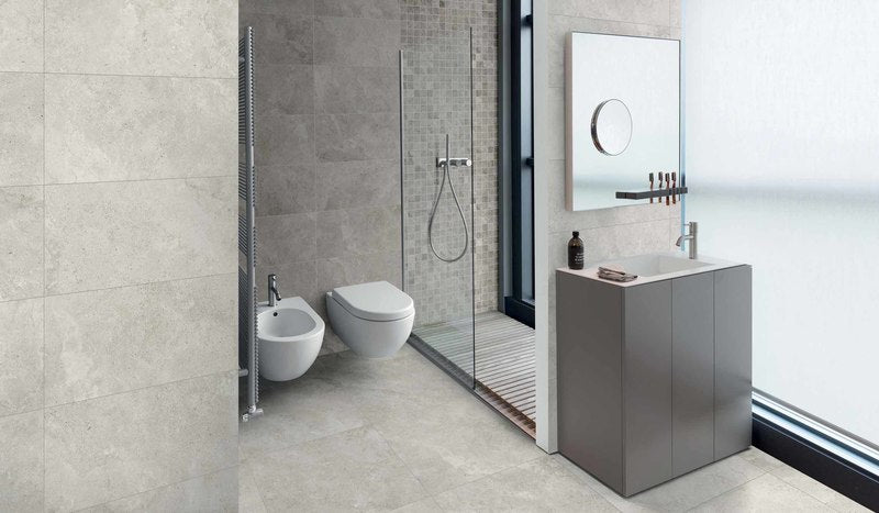 modern Bathroom installed with porcelain tiles on the floor and walls.