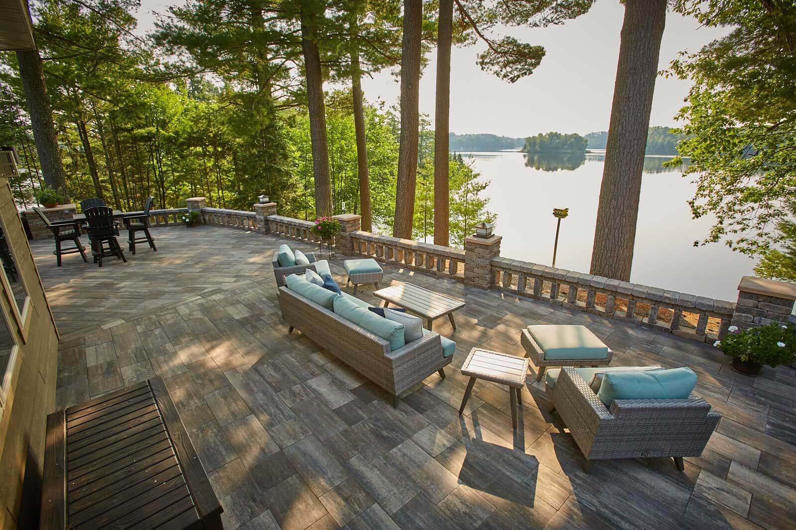 Grand milestone Patio used as a deck looking out on a lake