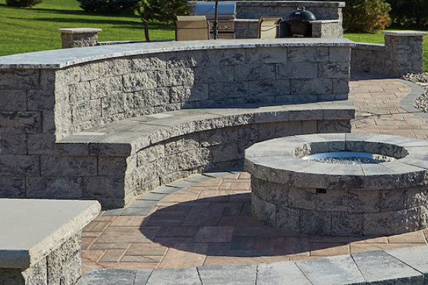 Fire pit area with retaining wall and seating made with