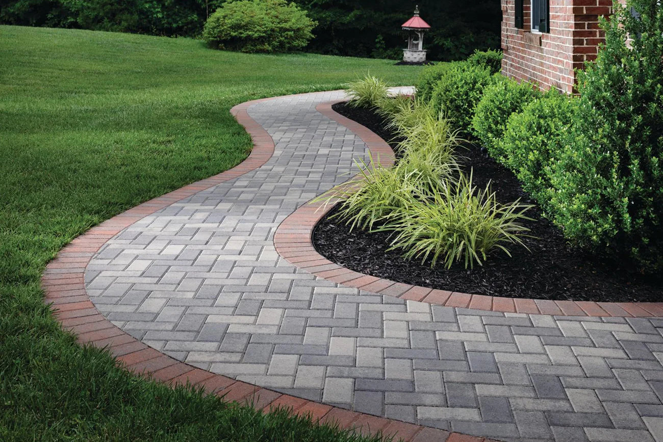 herringbone walkway made with a mixture of different coloured Holland Pavers.