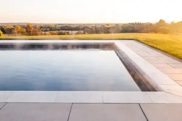 Prestige Coping used as pool coping with a beautiful prairie background.