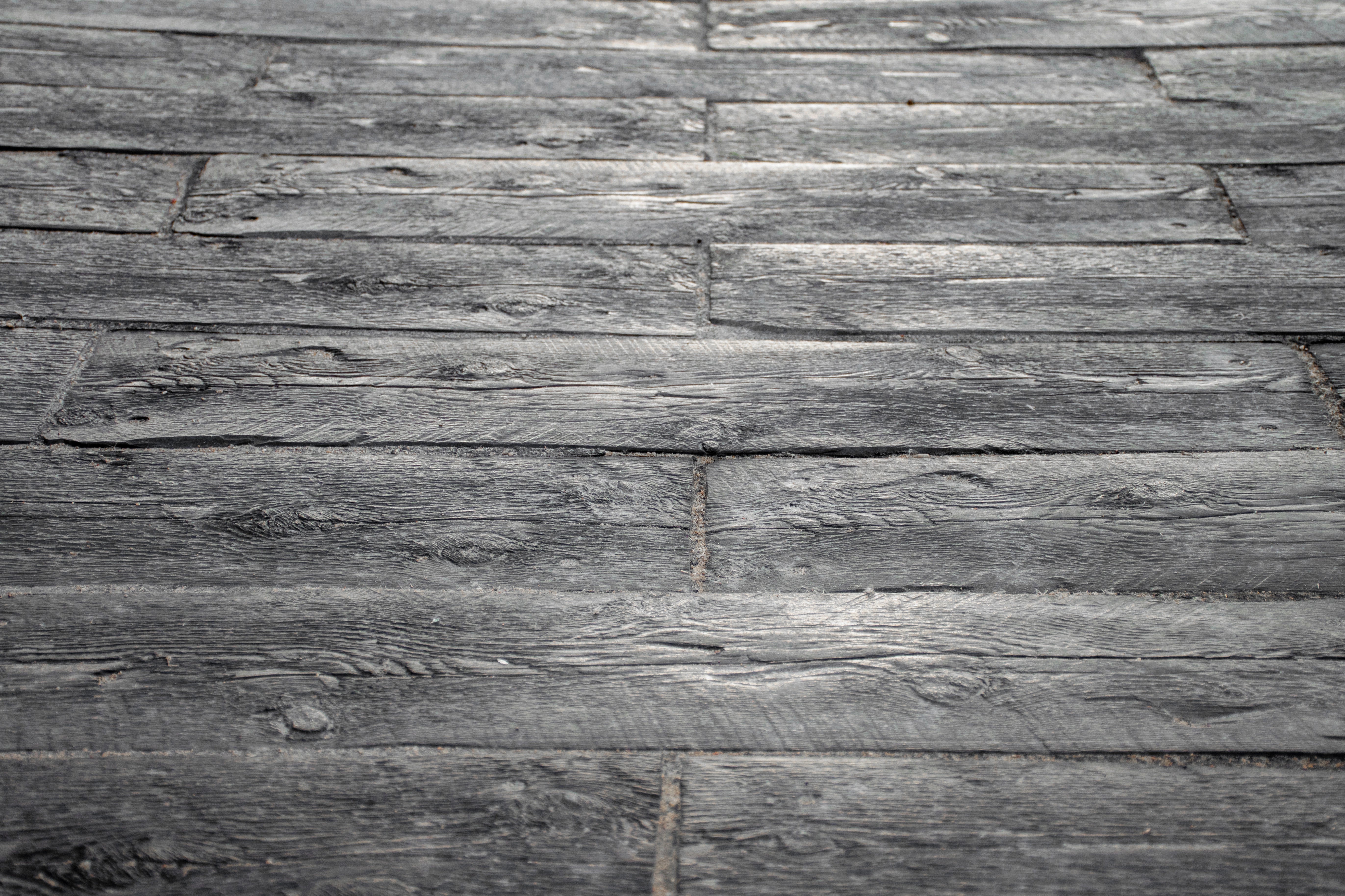 Patio Made with Barkwood Slabs that look like wood planks.