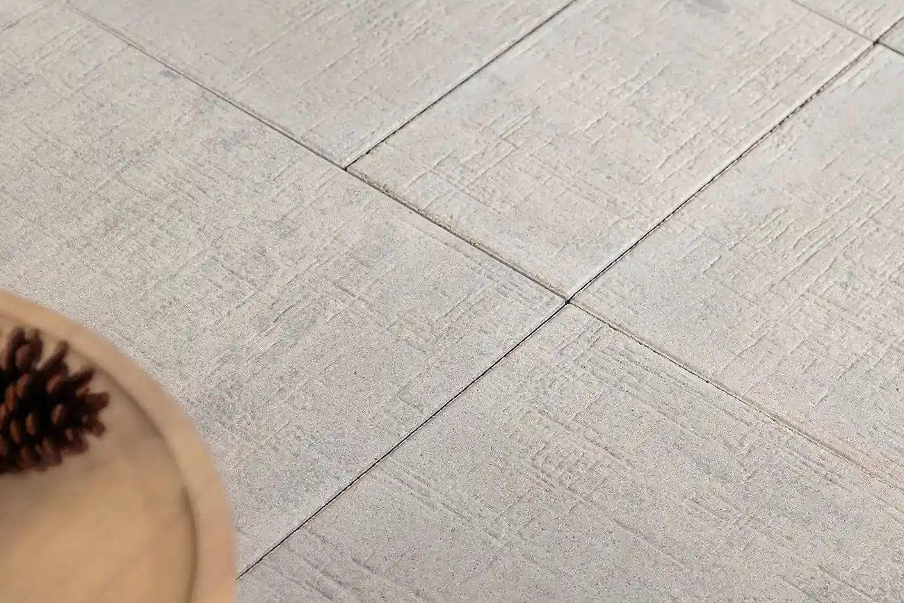 Patio made with Grand Tranquility pavers with a poolside bar and fire pit area