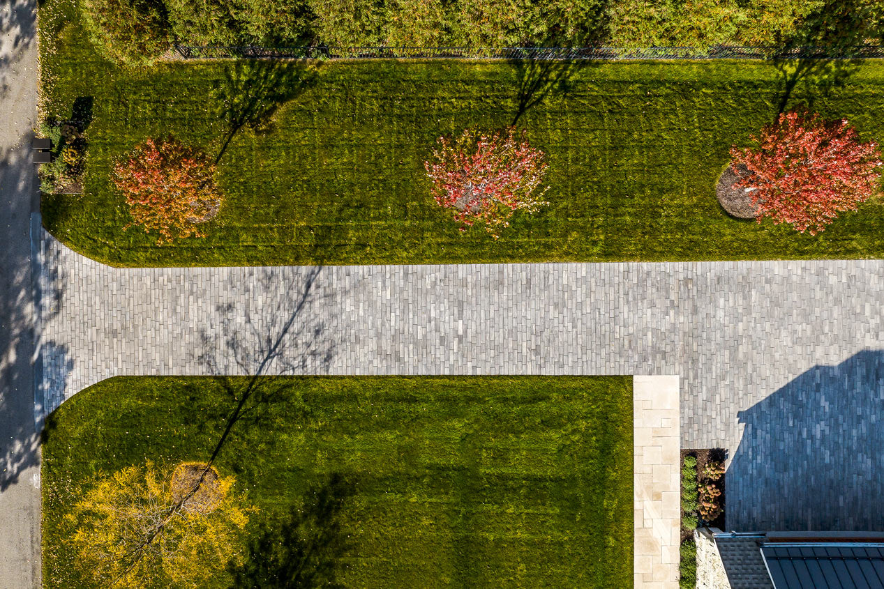 Birds eye view of a driveway built with Influence Pavers