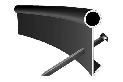 Raised flower bed with a retaining wall that is capped with Windsor Wall Caps