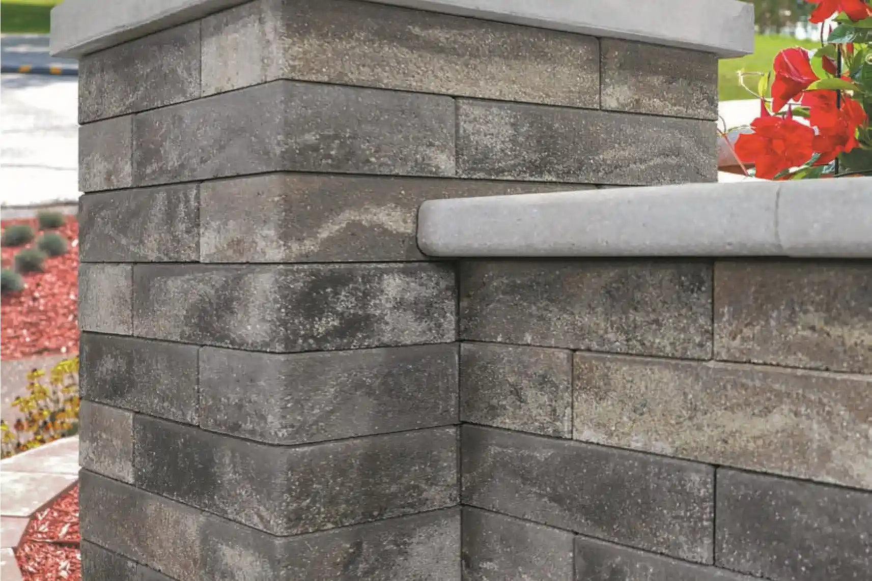 Freestanding stone wall with a pillar both made with Unity Wall Blocks