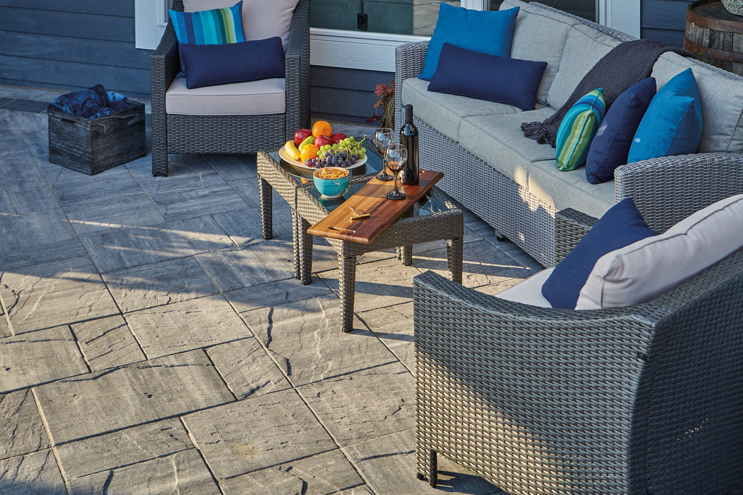 Patio seating area made with grand Vantage Pavers in the Majestic colour style.