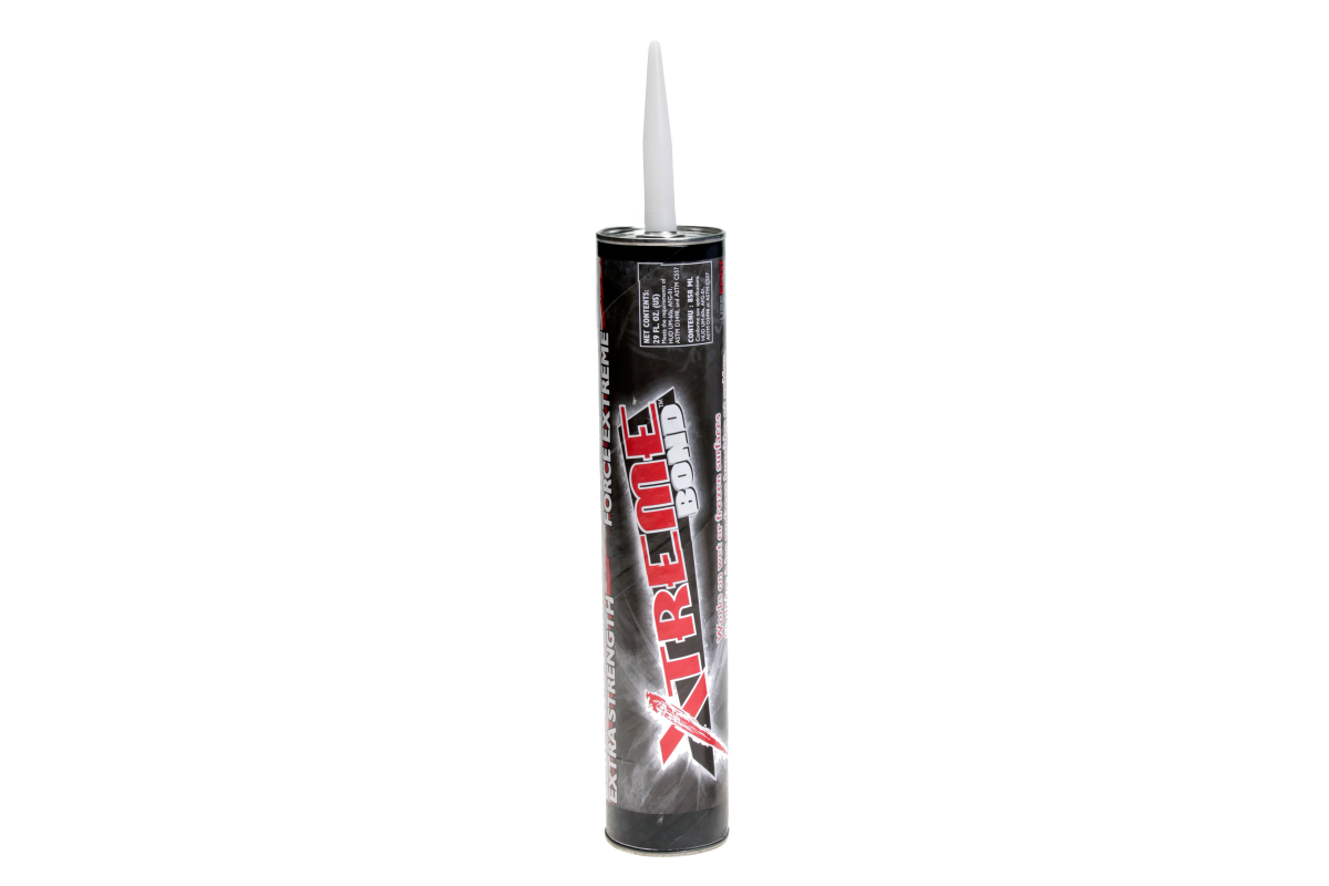 Raised flower bed with a retaining wall that is capped with Windsor Wall Caps