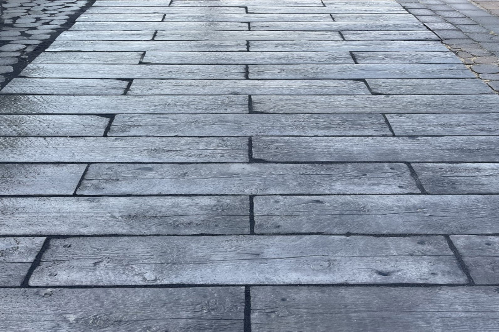 Patio made with a wood finished slab known as Barkwood Slabs